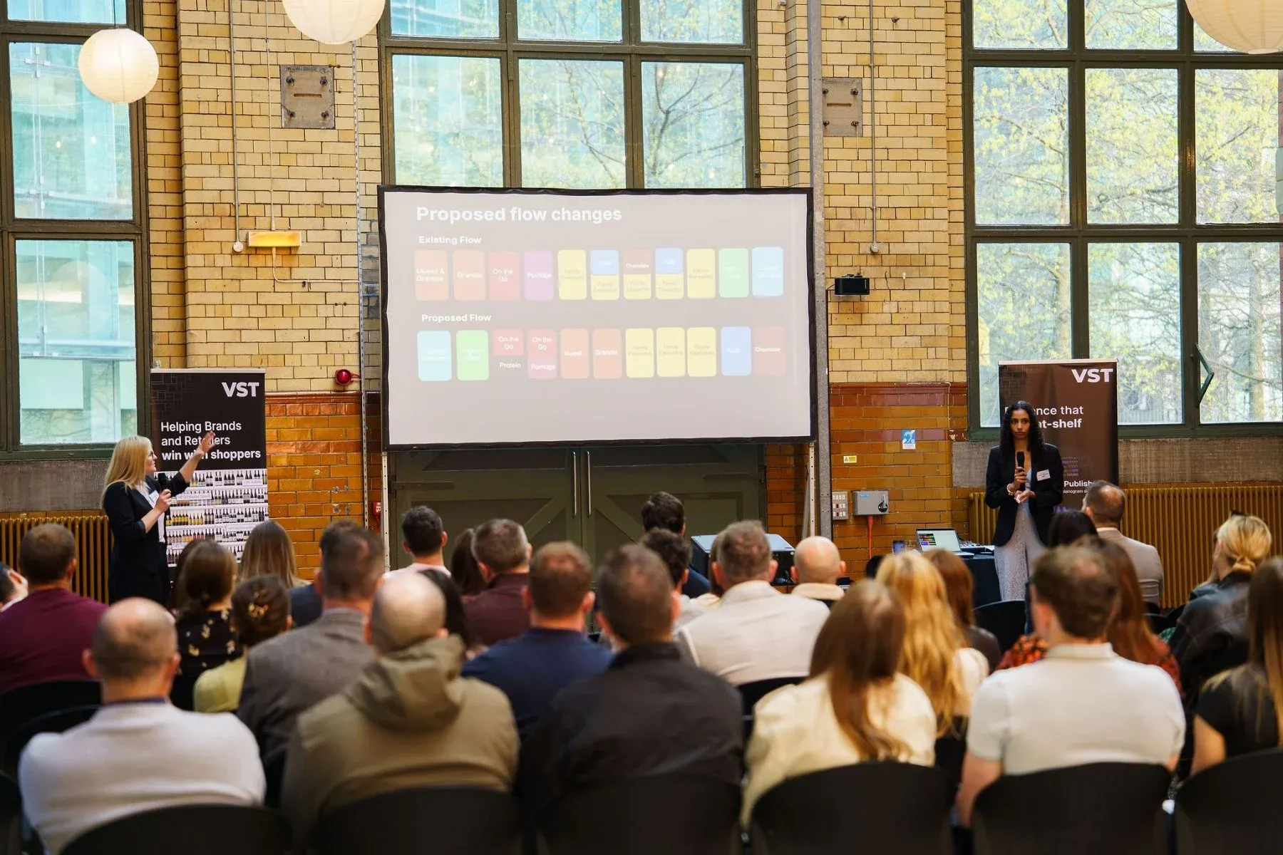 Attendees watching a category session at a previous Vazen event