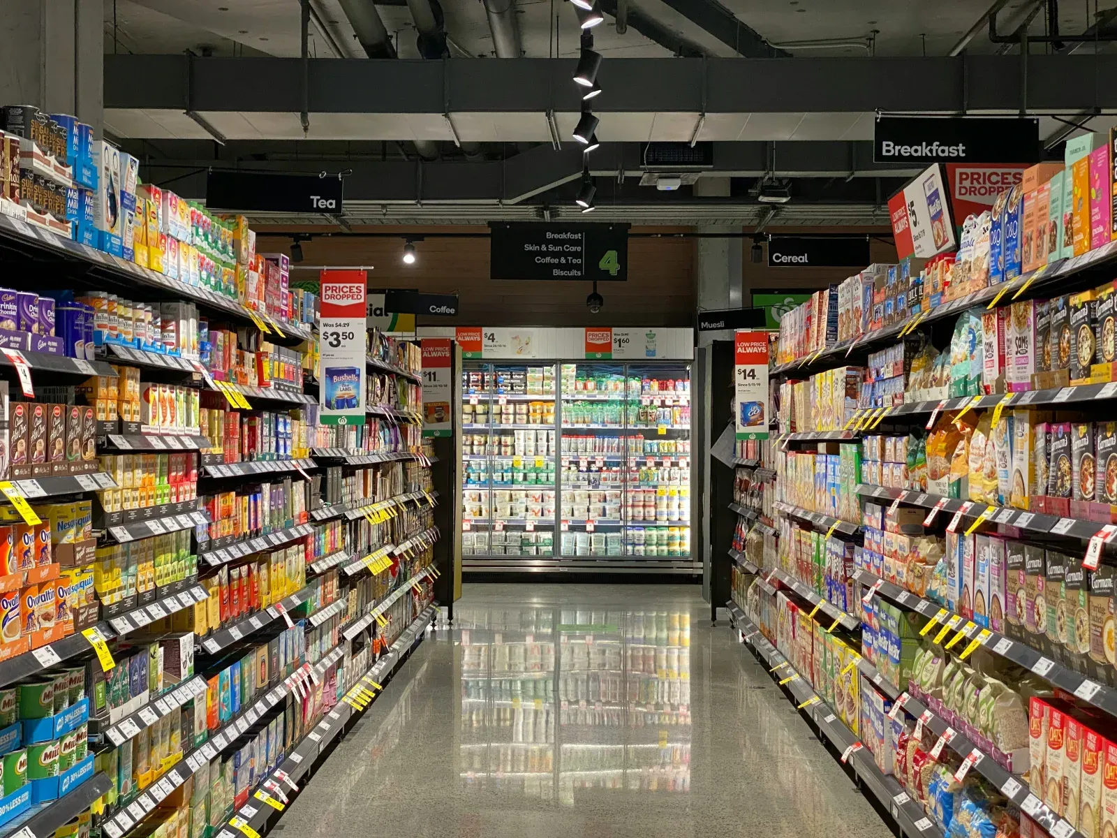 A supermarket aisle lined with breakfast products.